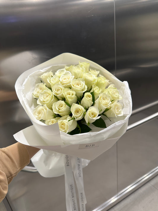 Bouquet of 24 white roses (in white packaging)