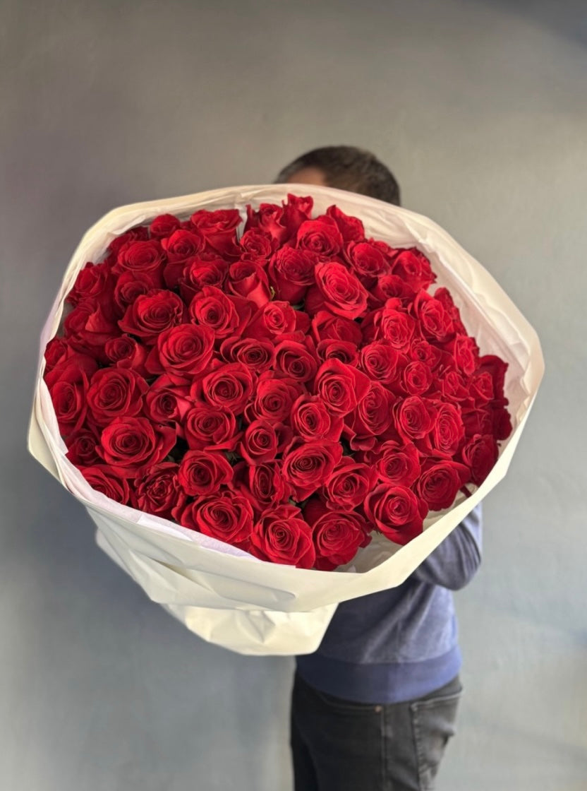 100 raspberry-red roses (raspberry hue)