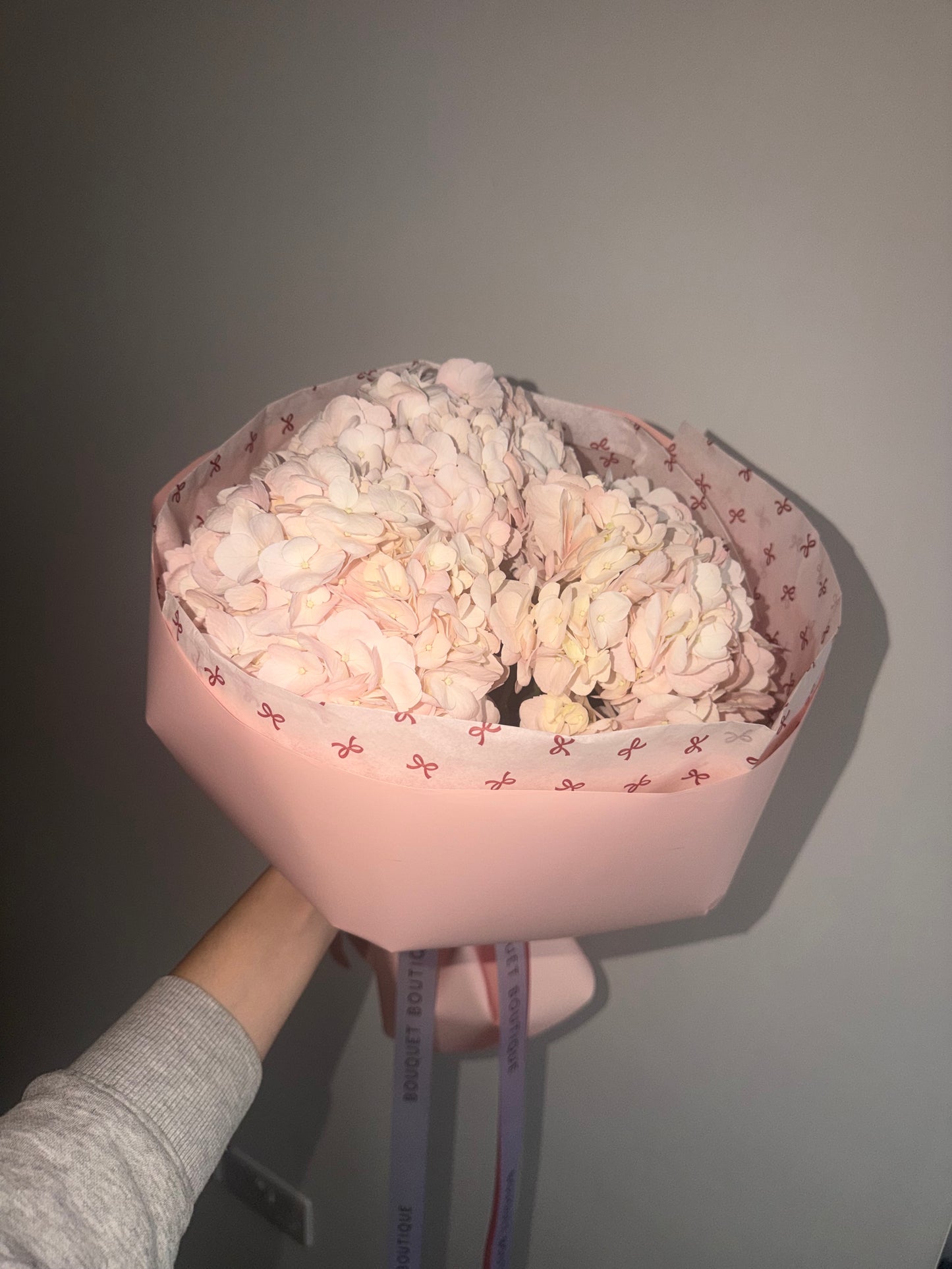 Cute bouquet of hydrangeas in pink package | Women’s Day Flower Bouquet