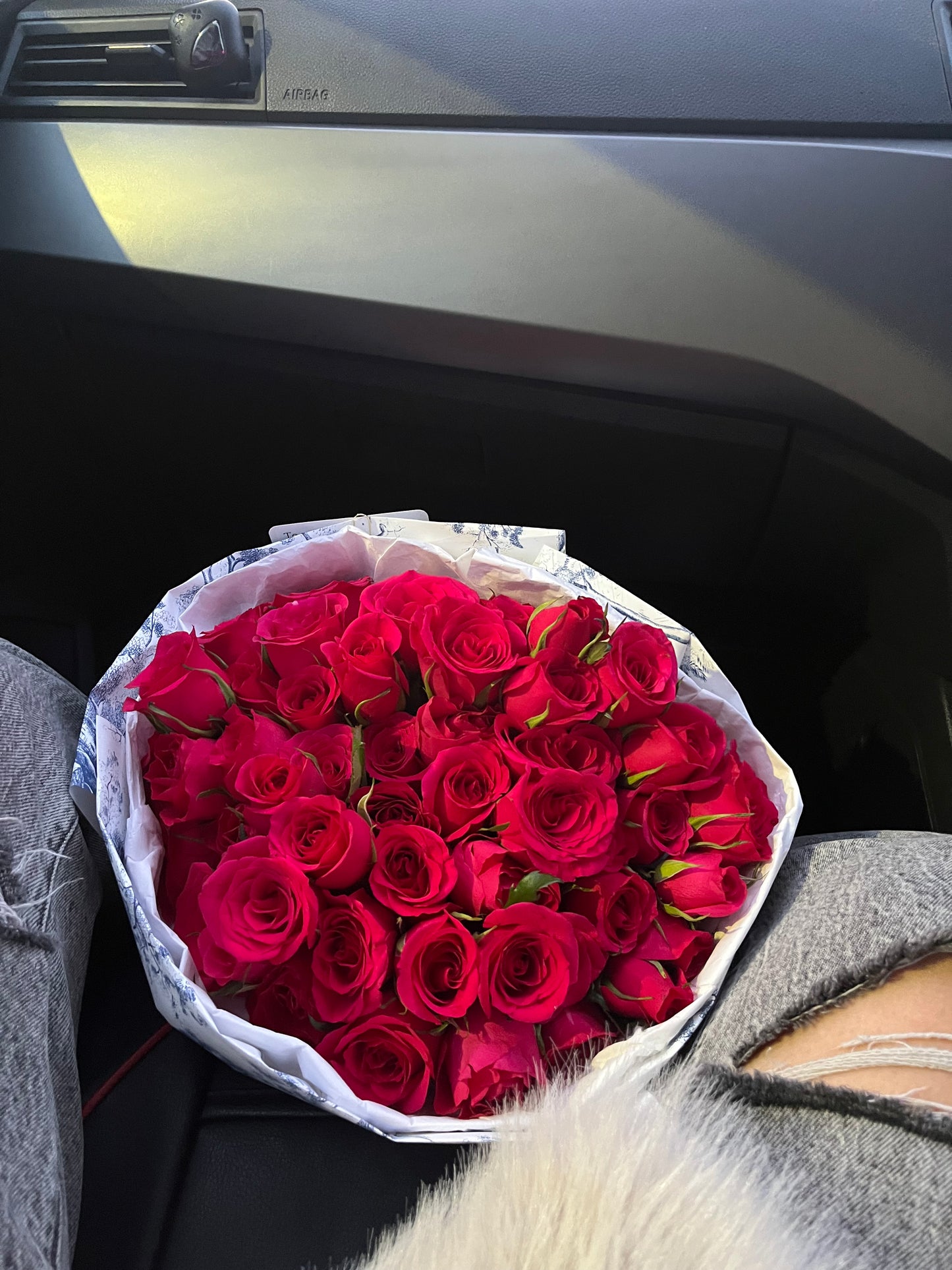 Dior-style bouquet of 50 raspberry-red roses