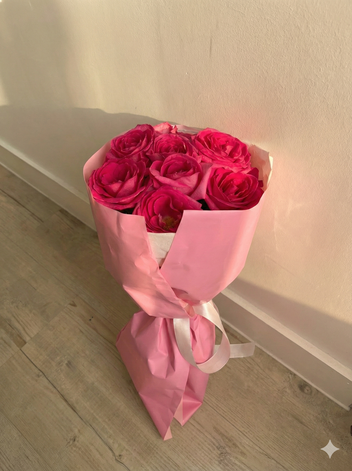 A bouquet of 13 pink roses