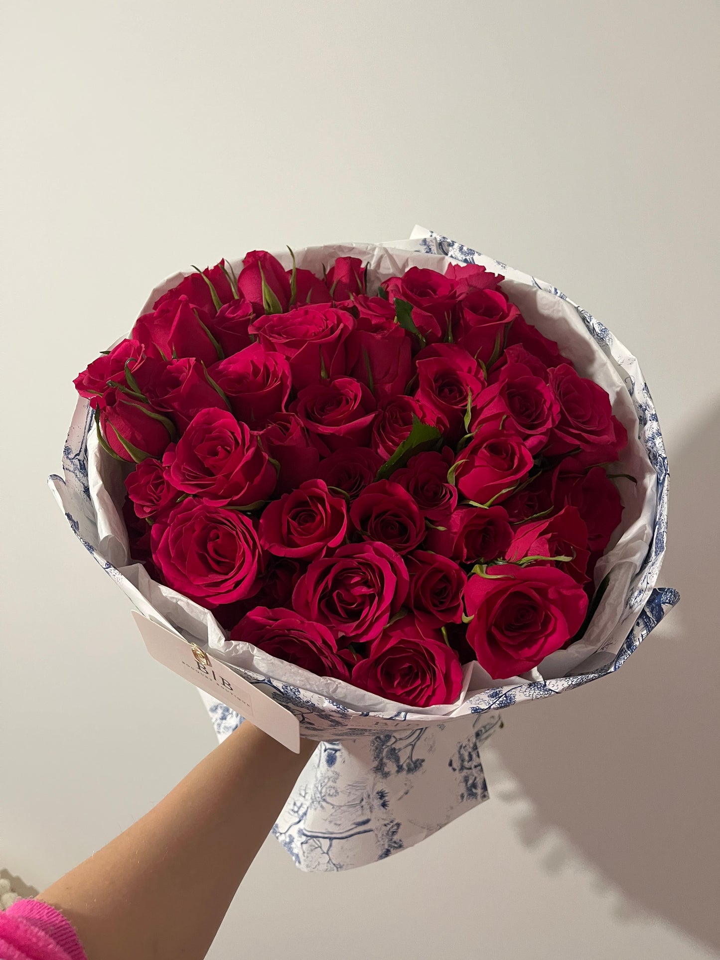 Dior-style bouquet of 50 raspberry-red roses