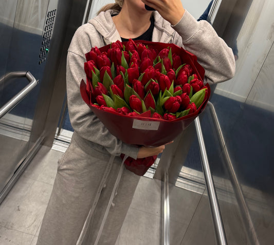 Luxury bouquet of 50 tulips in red-vine wrapping