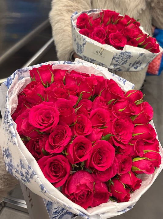 Parisian-style bouquet of 50 raspberry-red roses (raspberry hue)