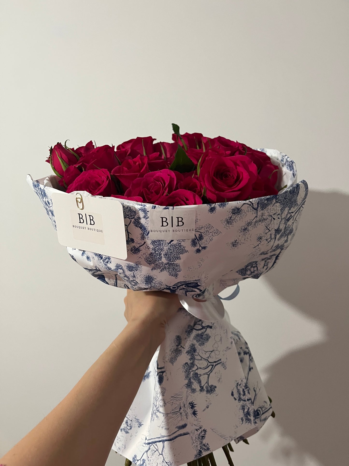 Dior-style bouquet of 50 raspberry-red roses