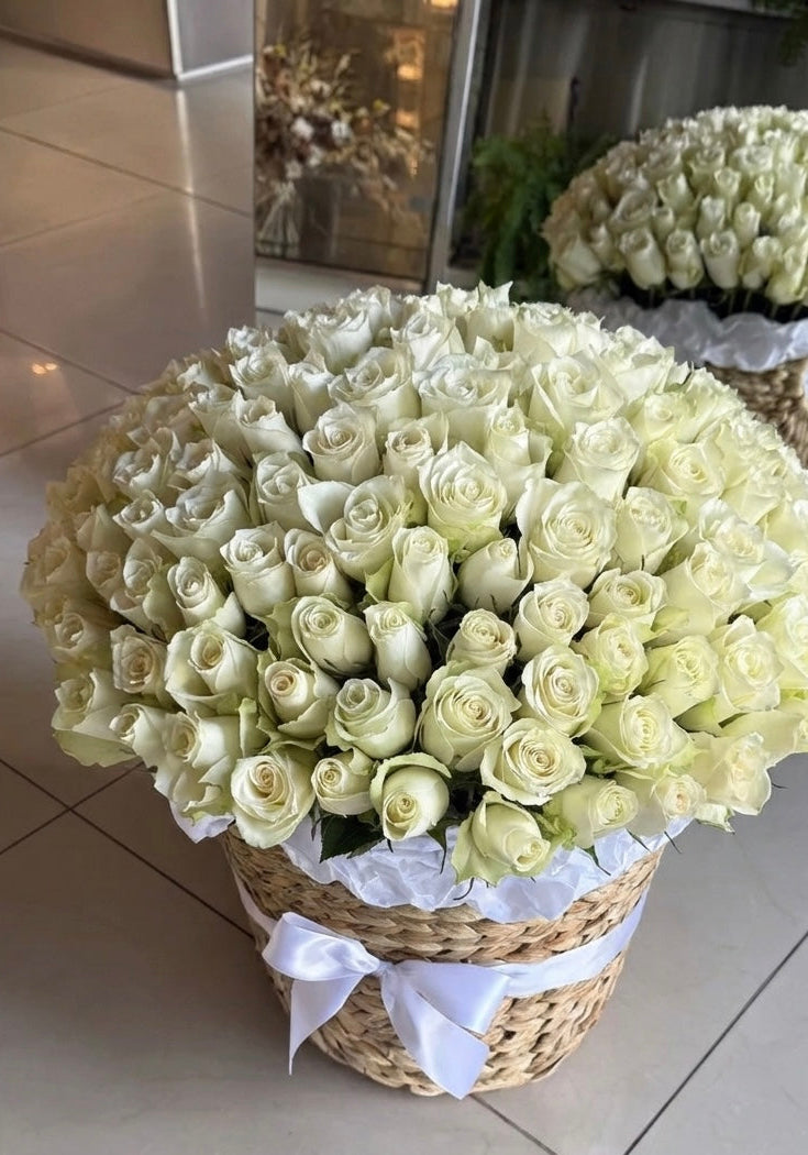 White roses in a basket