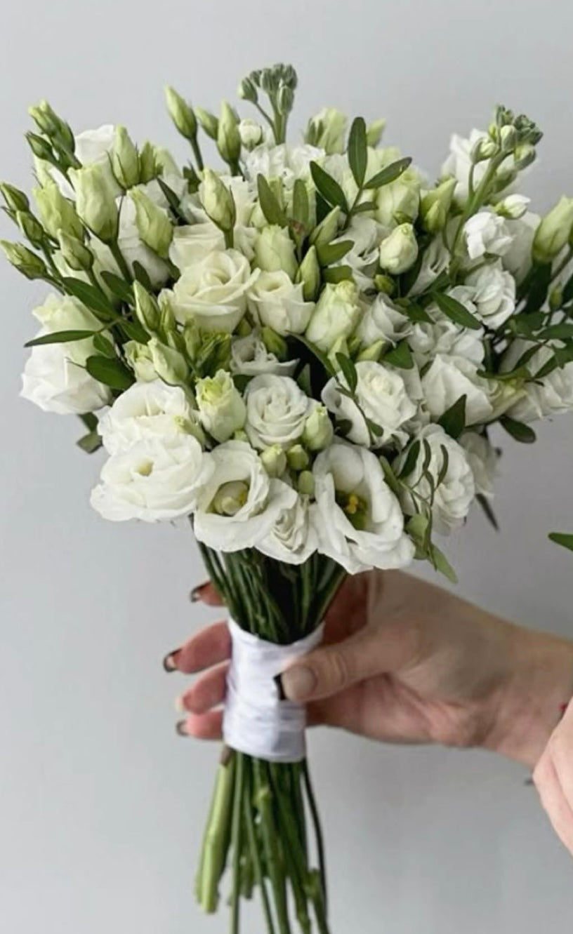 Elegant eustoma bridal bouquet for wedding day flowers