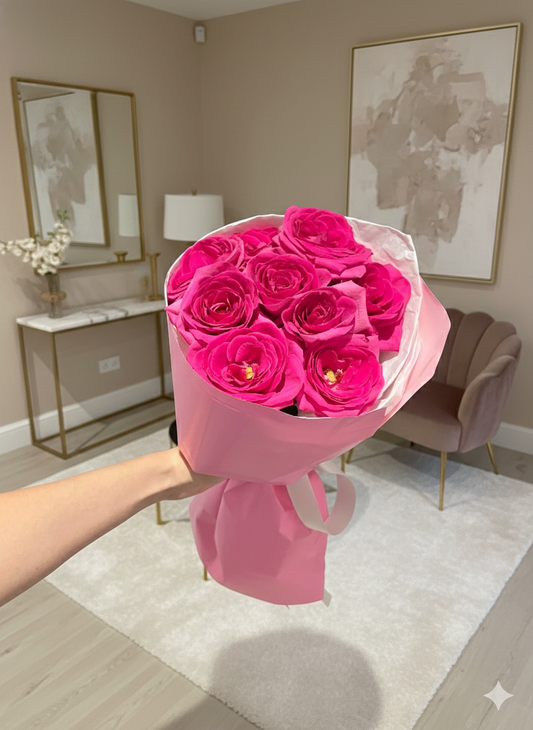 A bouquet of 9 pink roses