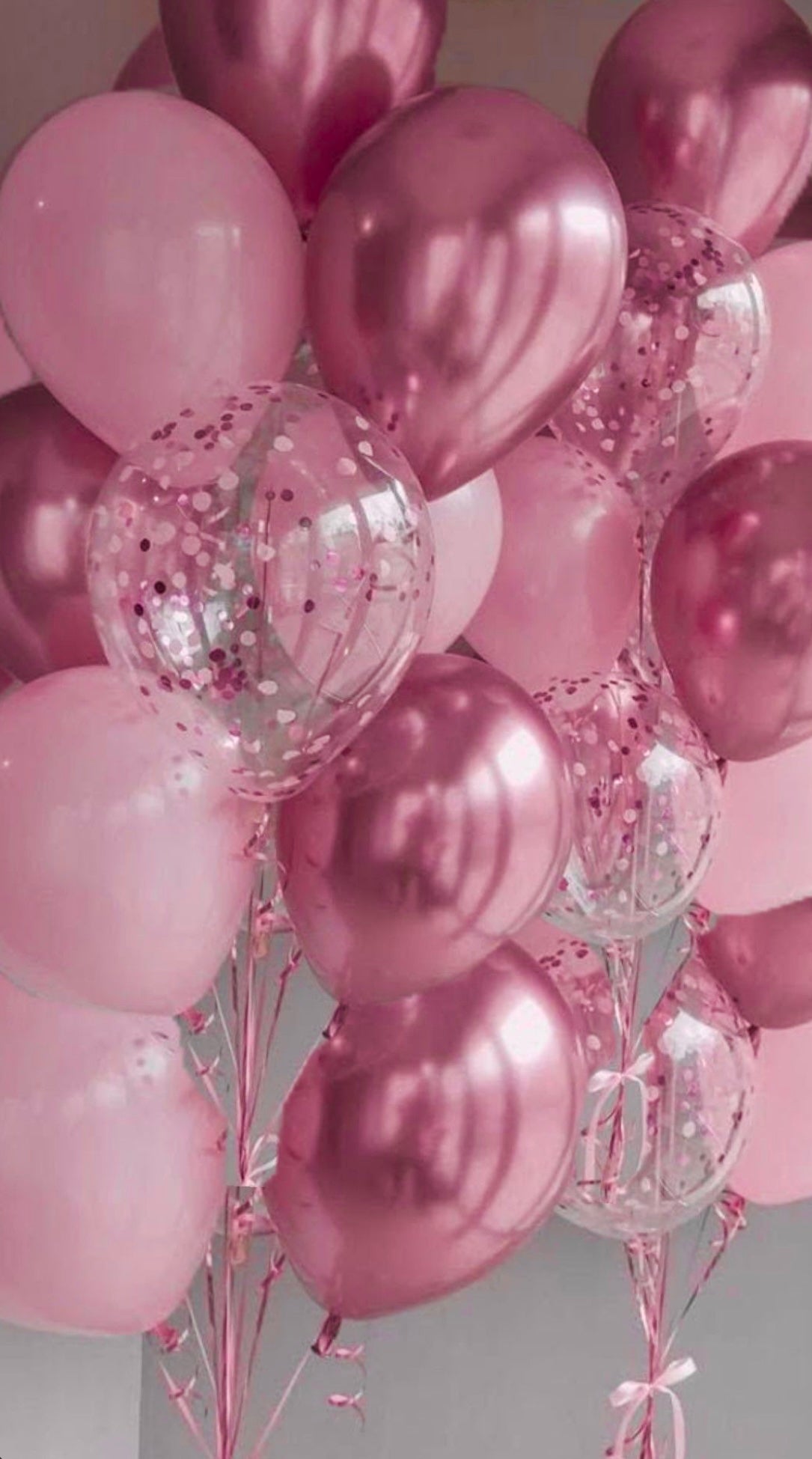 Helium balloons in pink